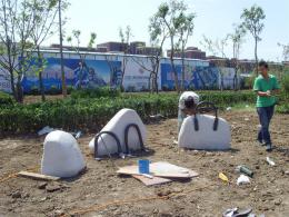 hj1736 石雕—箱包_青島國際服裝城不銹鋼雕塑、石雕、玻璃鋼雕塑_濱州宏景雕塑有限公司